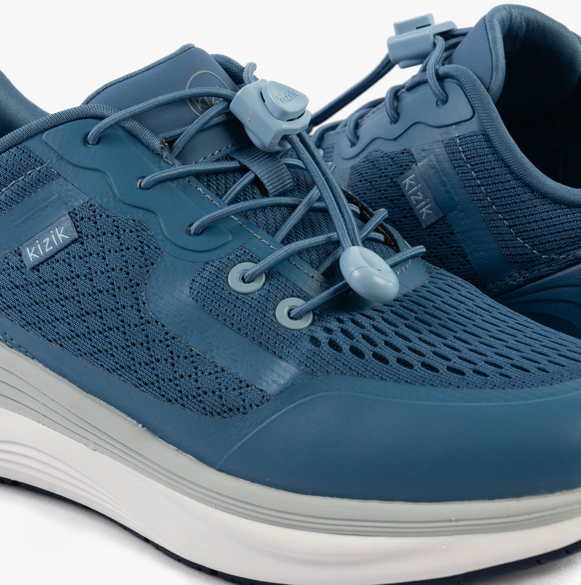 Kizik LONDON Womens Trainers Coronet Blue detail view of trainers with mesh upper and lace-up closure.
