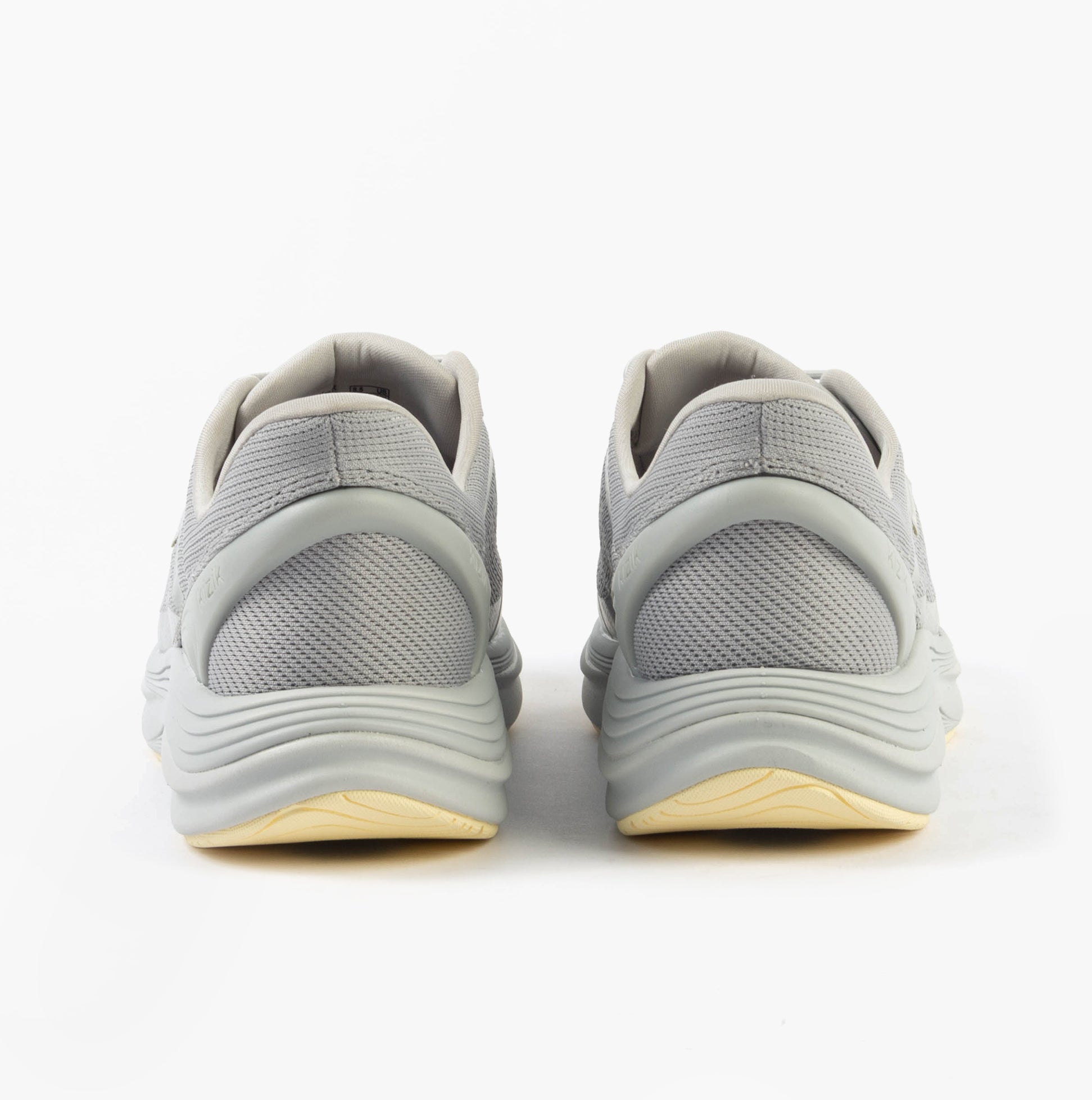 Kizik LONDON Womens Trainers Harbor Mist back view showing low top design and rubber sole.