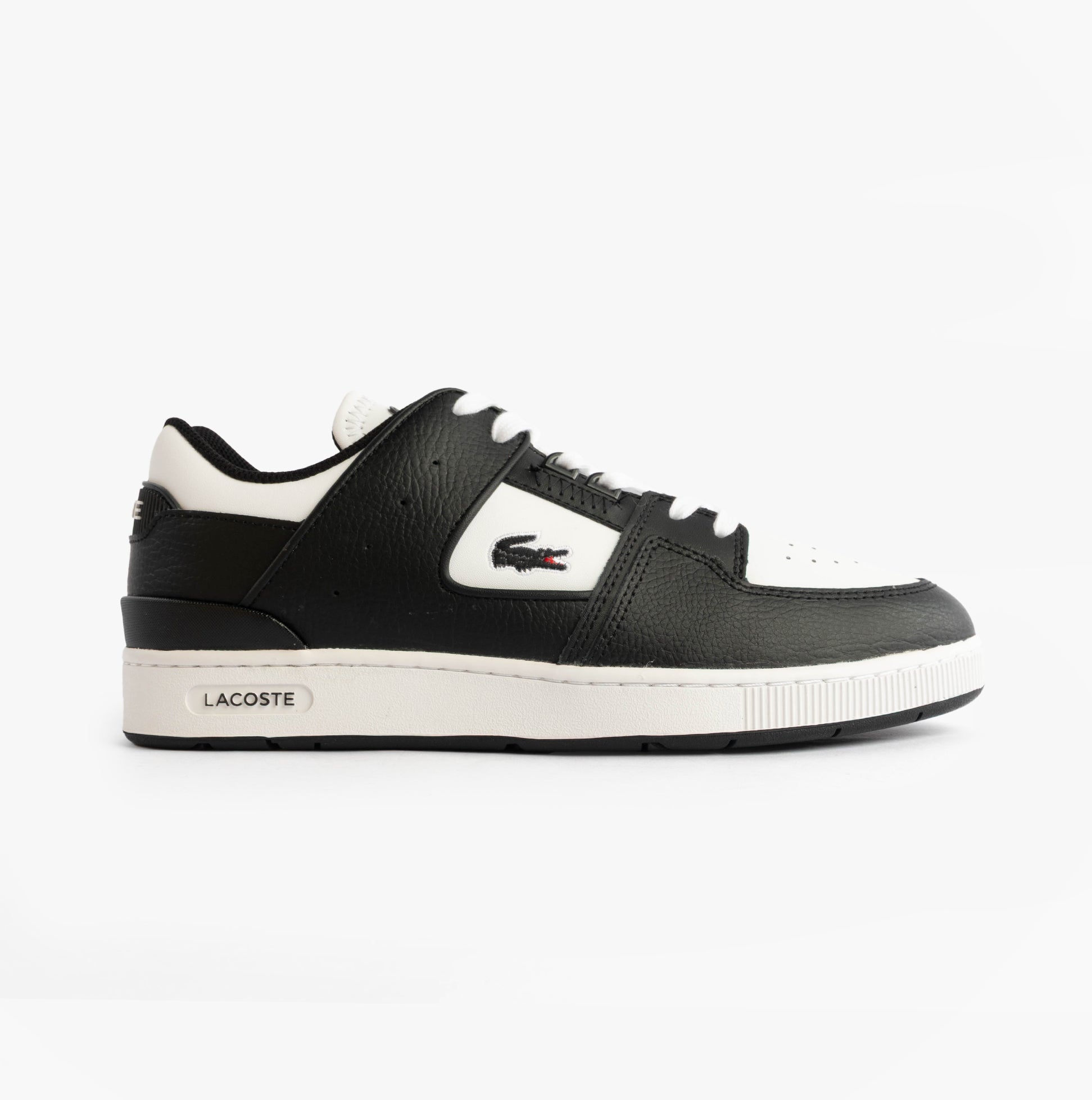 Lacoste COURT CAGE Mens Court Trainers Trainers Black/White side view displaying black leather upper and white sole.