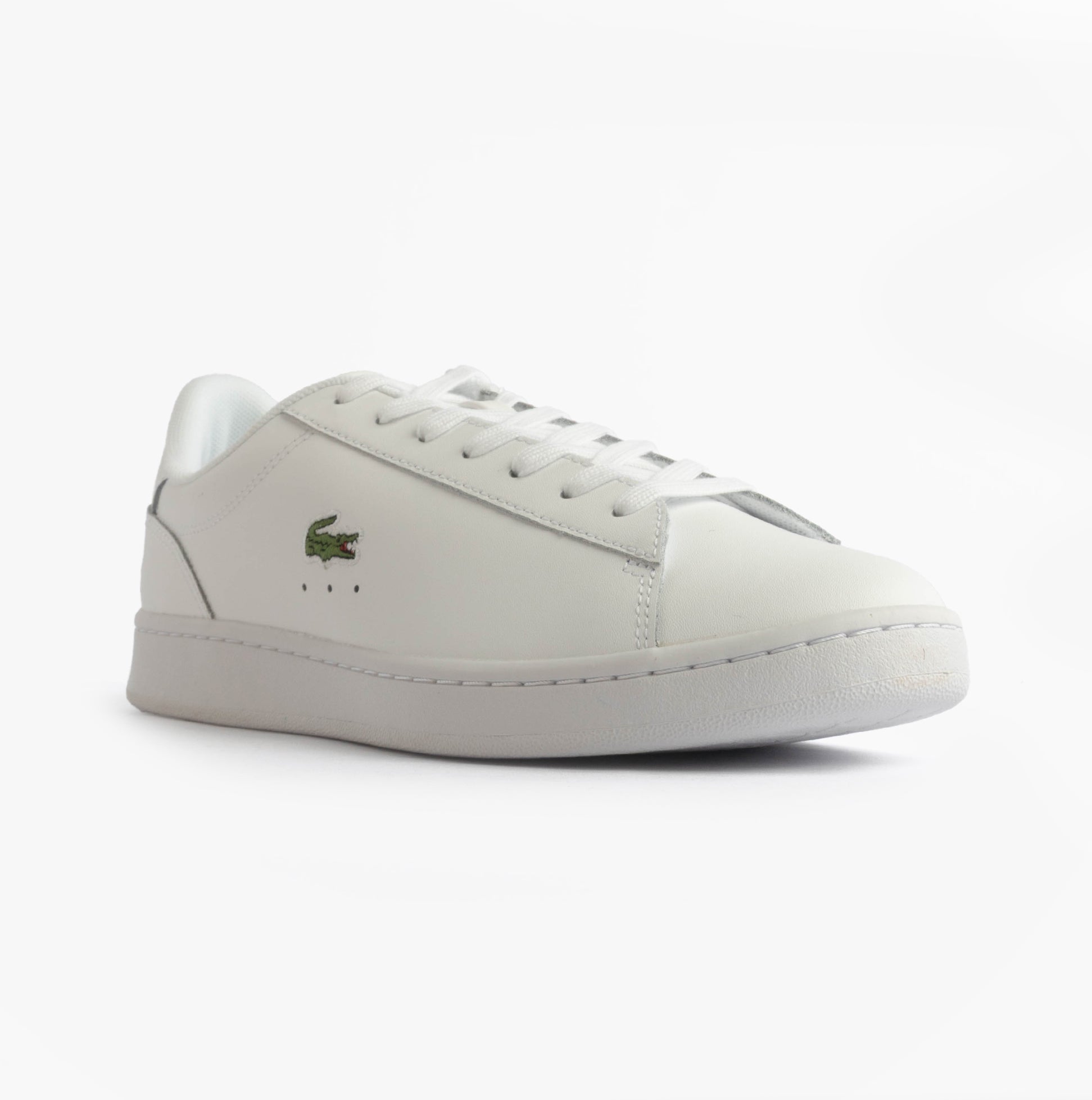 Lacoste CARNABY SET Mens Court Trainers Trainers White side view featuring leather upper and lace-up closure.