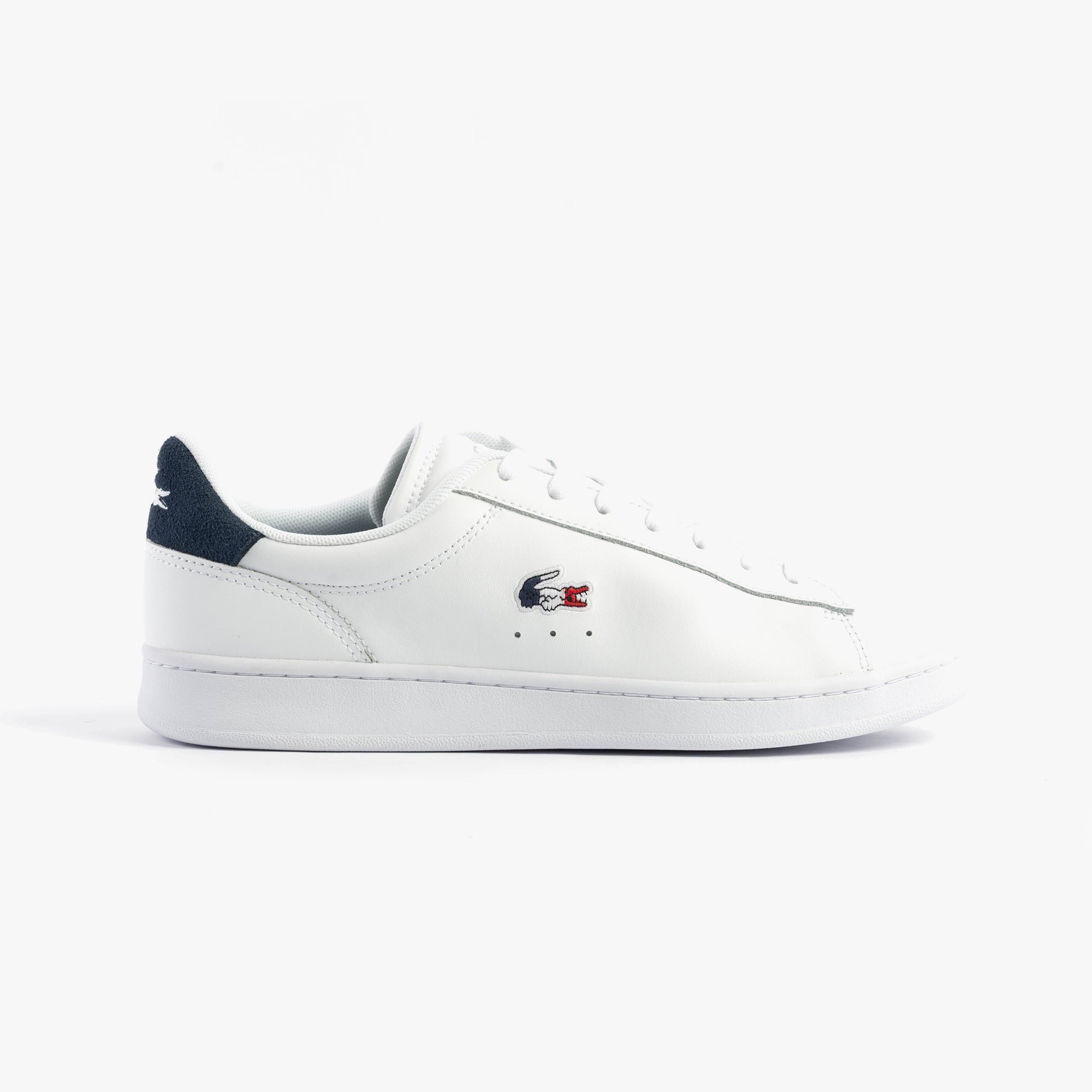 Lacoste CARNABY SET Mens Trainers White/Navy/Red side view of casual leather trainers with round toe and lace-up closure.
