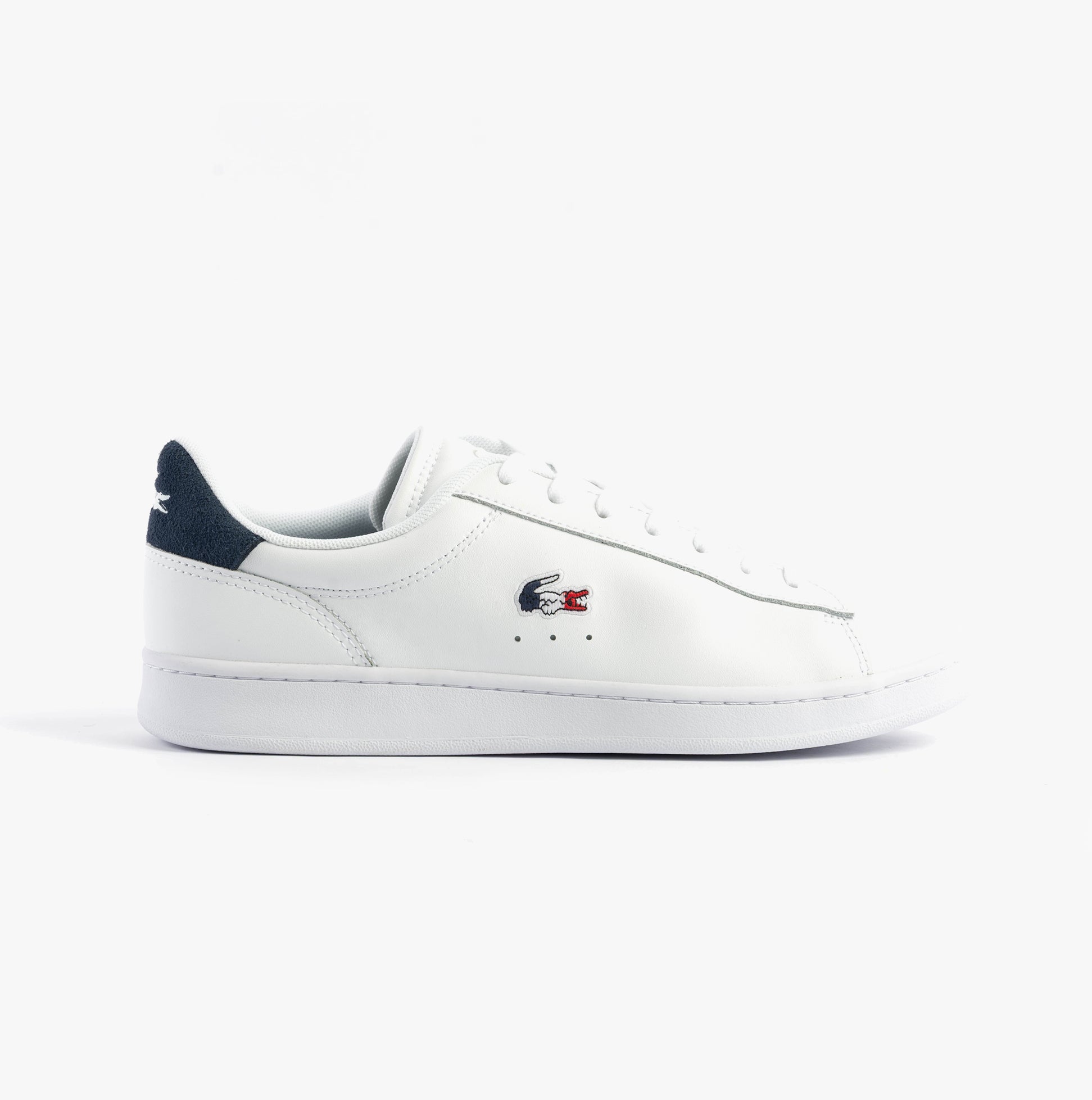 Lacoste CARNABY SET Mens Trainers White/Navy/Red side view of casual leather trainers with round toe and lace-up closure.