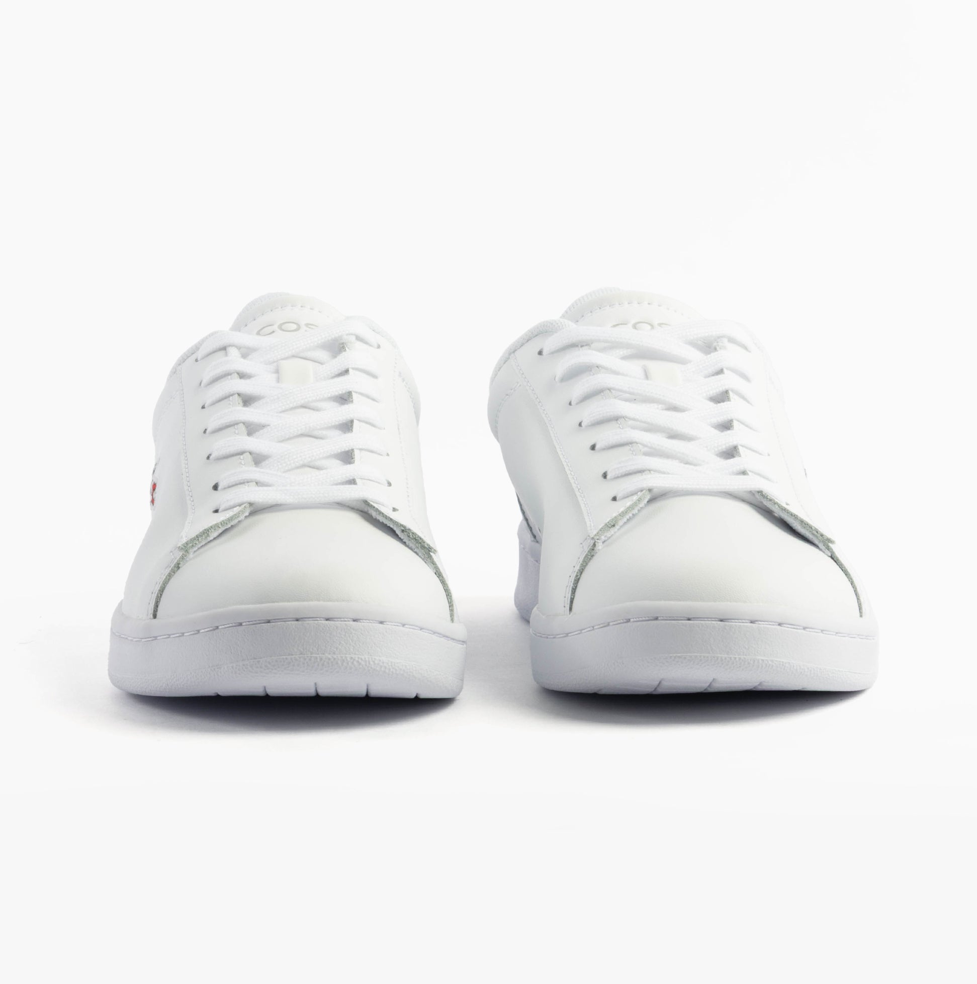 Lacoste CARNABY SET Mens Trainers White/Navy/Red front view showcasing lace-up design and low top heel.