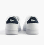 Lacoste CARNABY SET Mens Trainers White/Navy/Red rear view showcasing leather upper and logo detail.