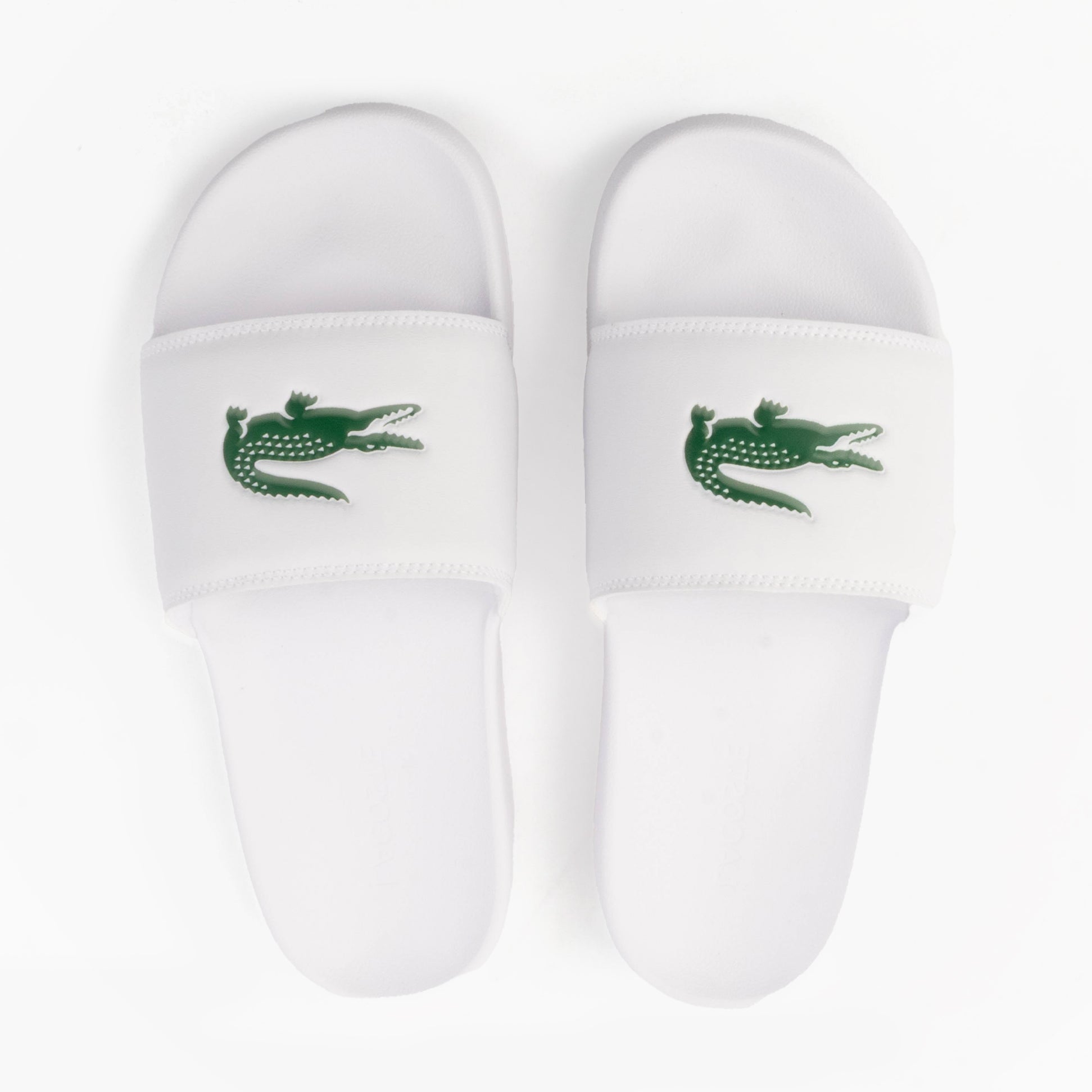 Lacoste SERVE SLIDE 0.0 Mens Slides White/Green top view showing the strap and logo design.