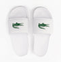 Lacoste SERVE SLIDE 0.0 Mens Slides White/Green top view showing the strap and logo design.