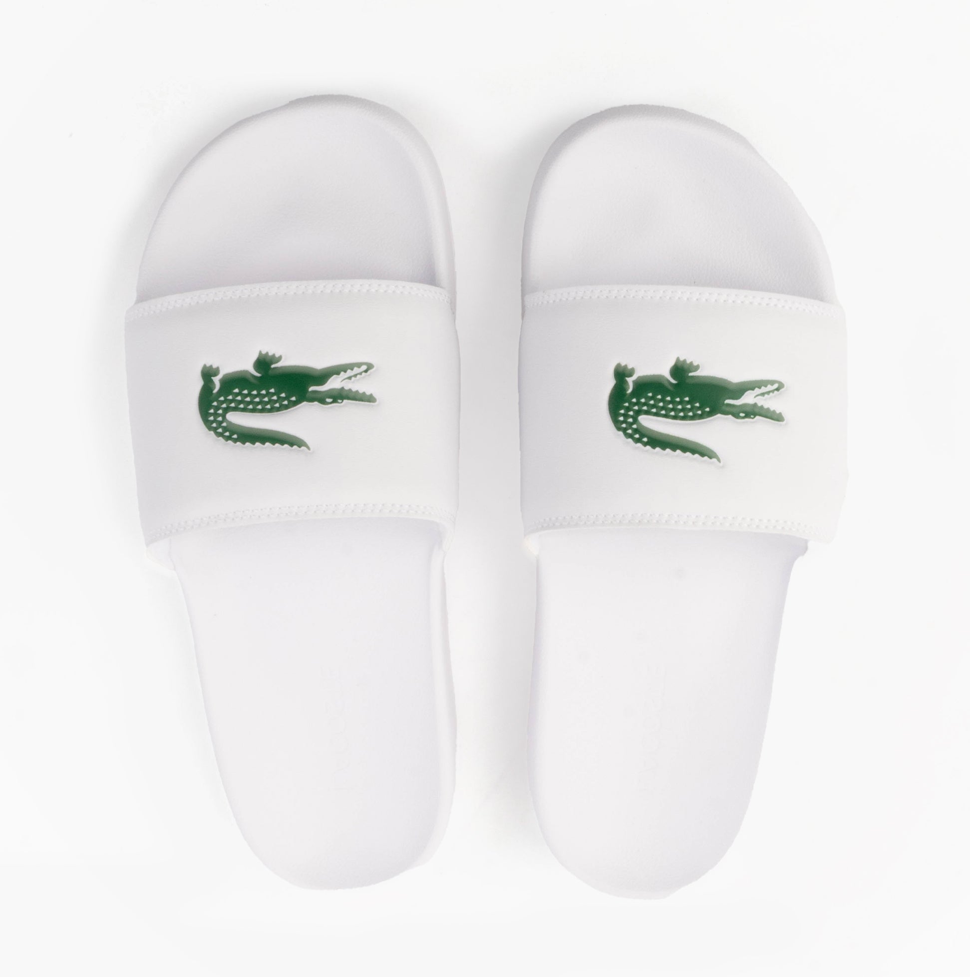Lacoste SERVE SLIDE 0.0 Mens Slides White/Green top view showing the strap and logo design.