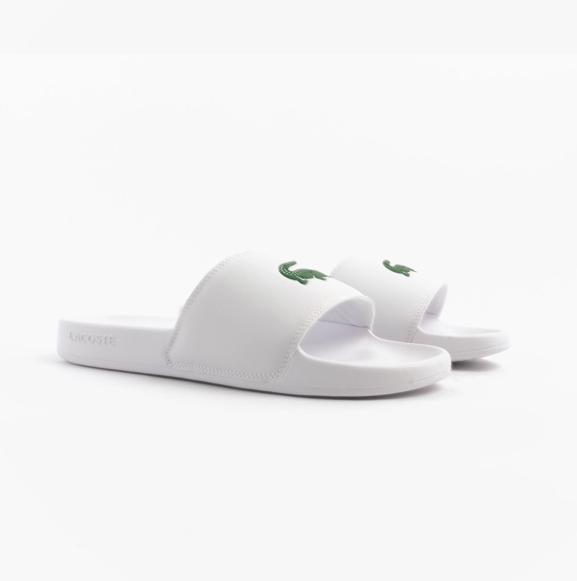 Lacoste SERVE SLIDE 0.0 Mens Slides White/Green side view showcasing the comfortable EVA slip-on design.