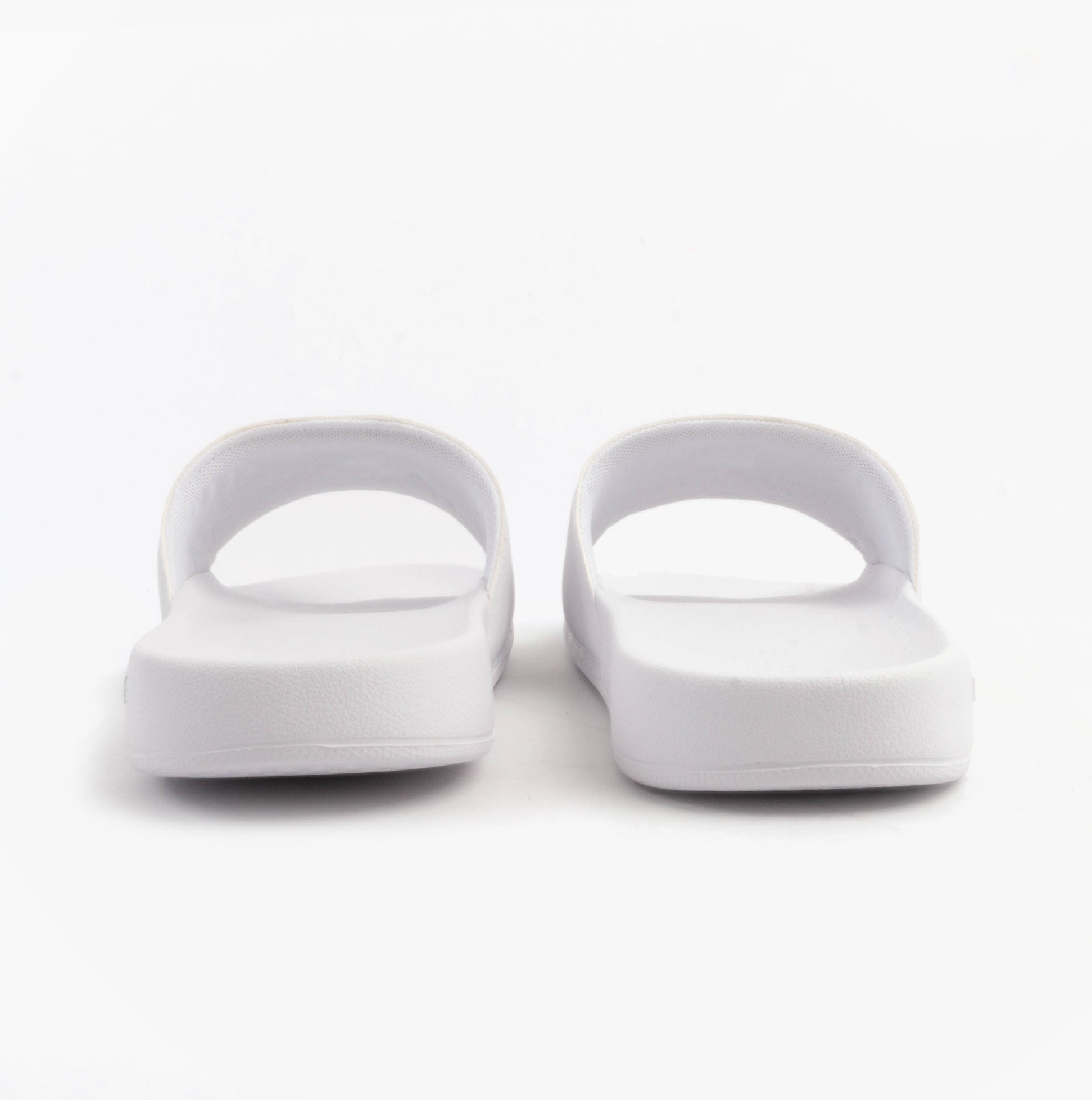 Lacoste SERVE SLIDE 0.0 Mens Slides White/Green back view showcasing simple and sleek design.