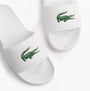 Lacoste SERVE SLIDE 0.0 Mens Slides White/Green top view showing logo and detail of slide design.