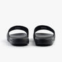 Lacoste SERVE SLIDE 0.0 Mens Slides Black/White rear view showcasing the slip-on design and EVA material.