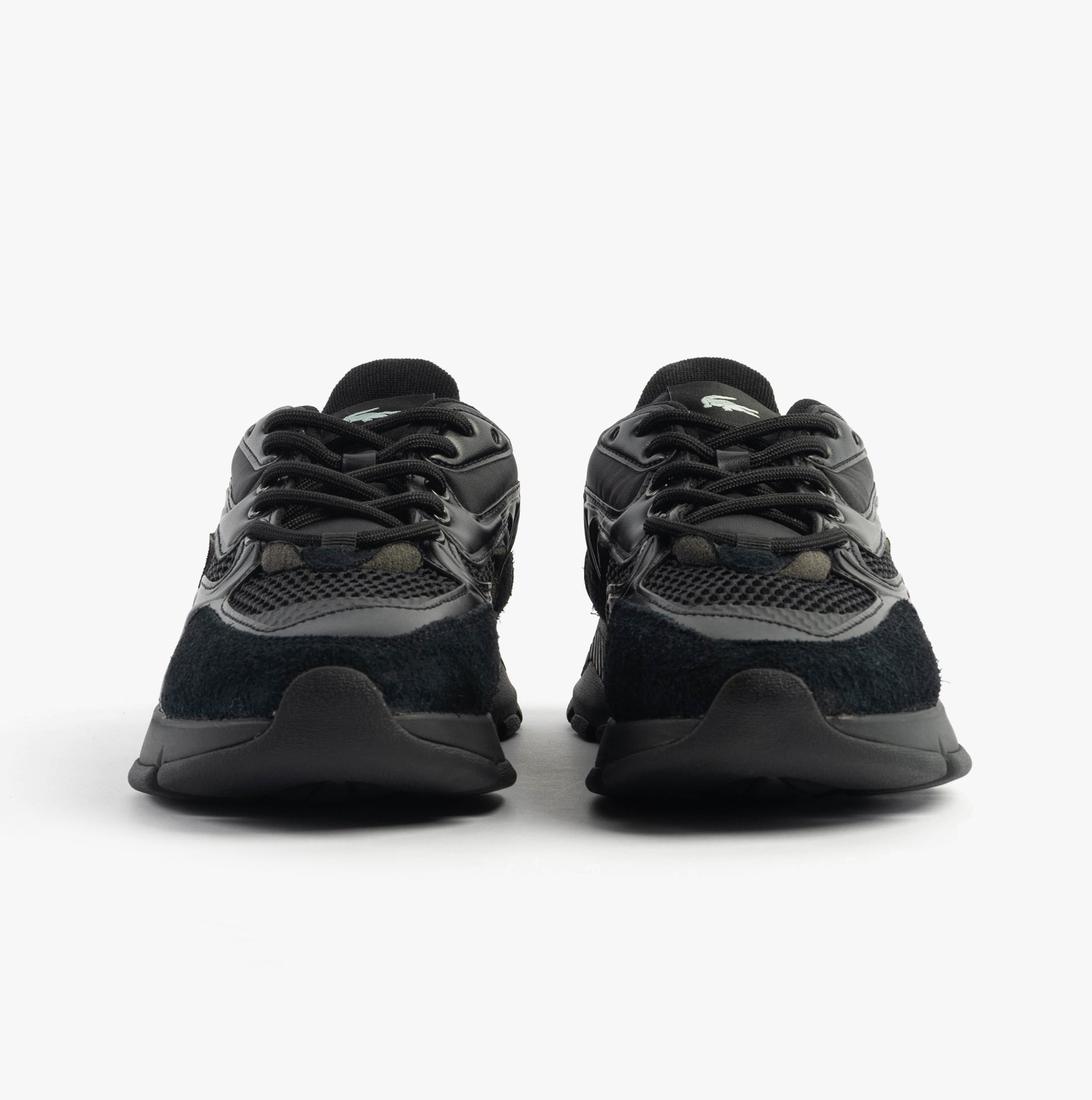 Lacoste L003 NEO Mens Trainers Black front view featuring lace-up closure and round toe design.