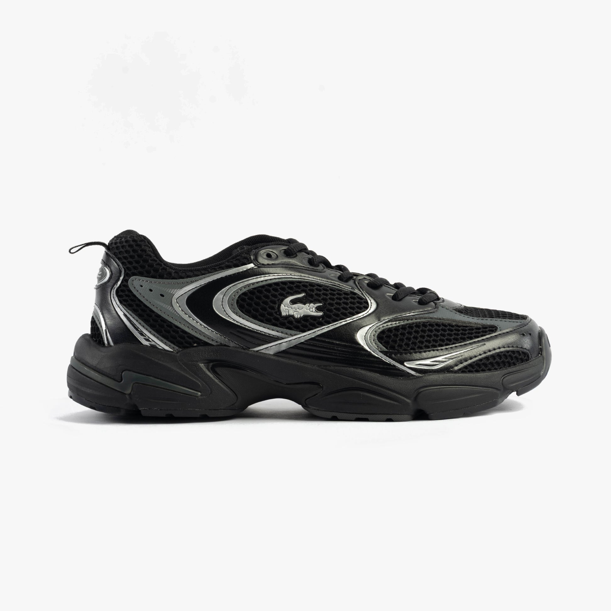 Lacoste STORM 96 2K Mens Trainers Black side view showing sleek design and mesh detailing.