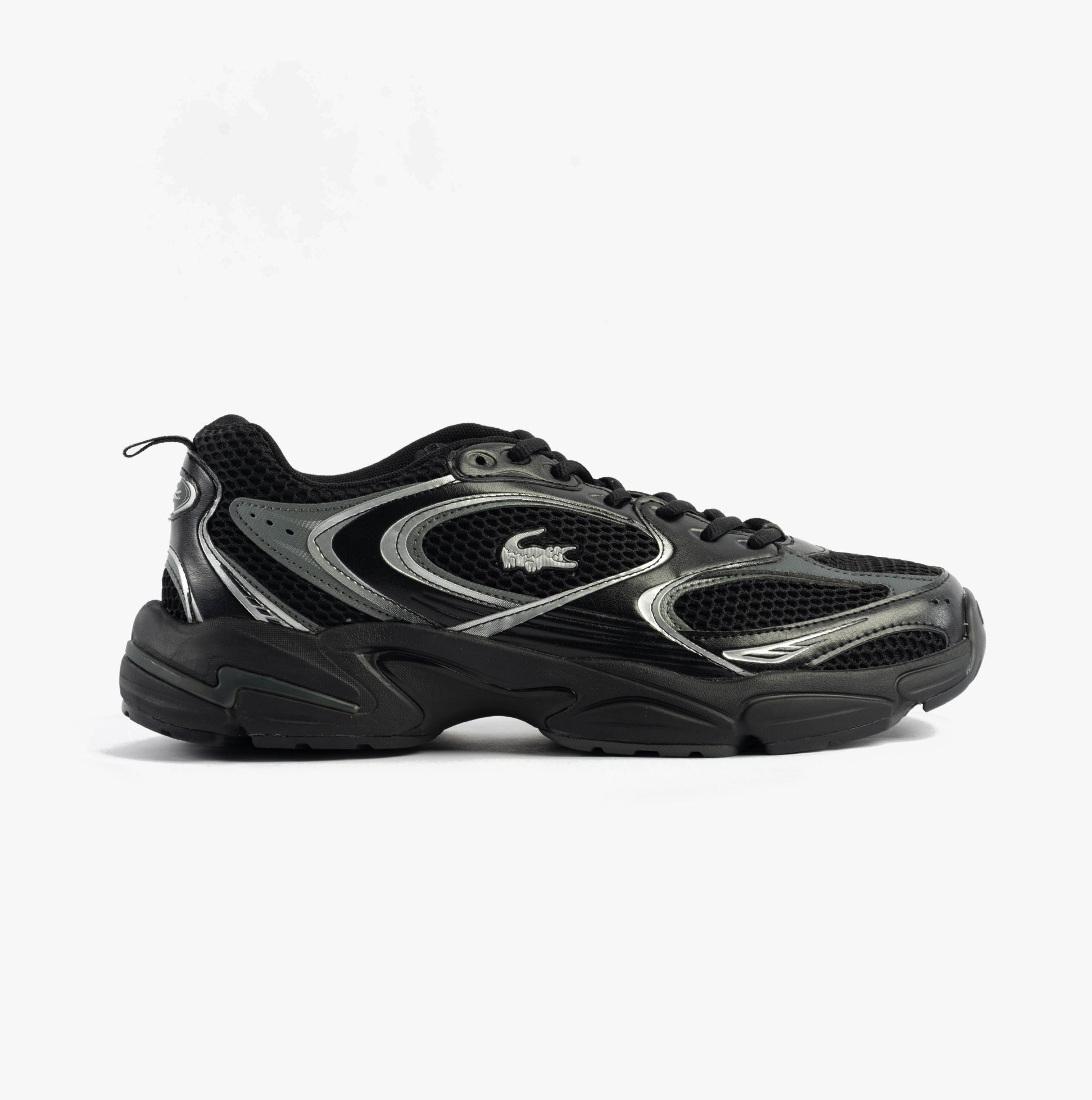 Lacoste STORM 96 2K Mens Trainers Black side view showing sleek design and mesh detailing.