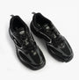 Lacoste STORM 96 2K Mens Trainers Black top view showing the casual leather and polyester design.