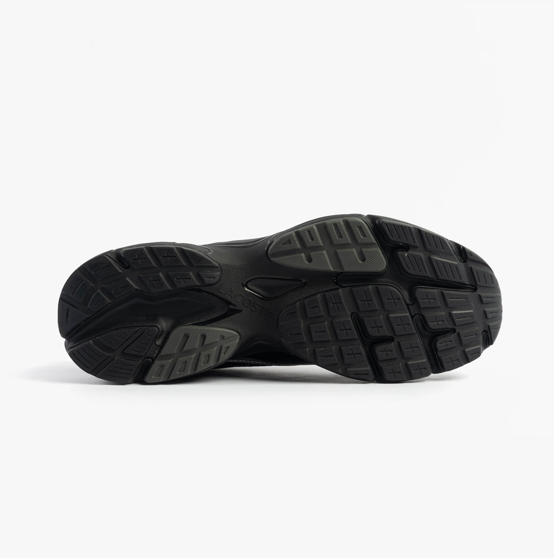 Lacoste STORM 96 2K Mens Trainers Black bottom view showcasing sole design and traction features.