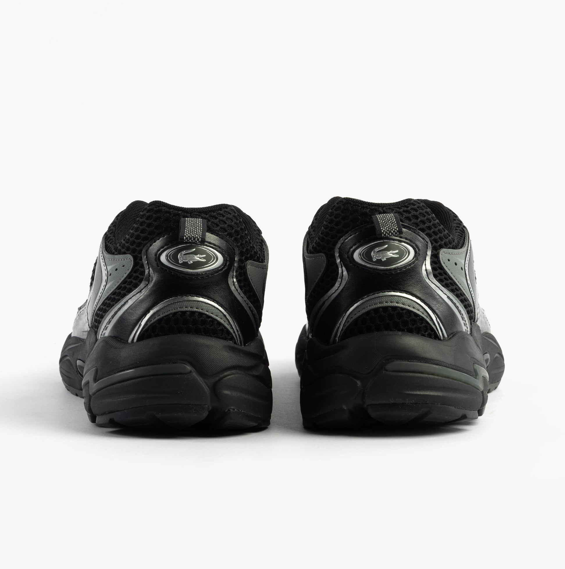 Lacoste STORM 96 2K Mens Trainers Black rear view showcasing sleek design and comfortable fit.