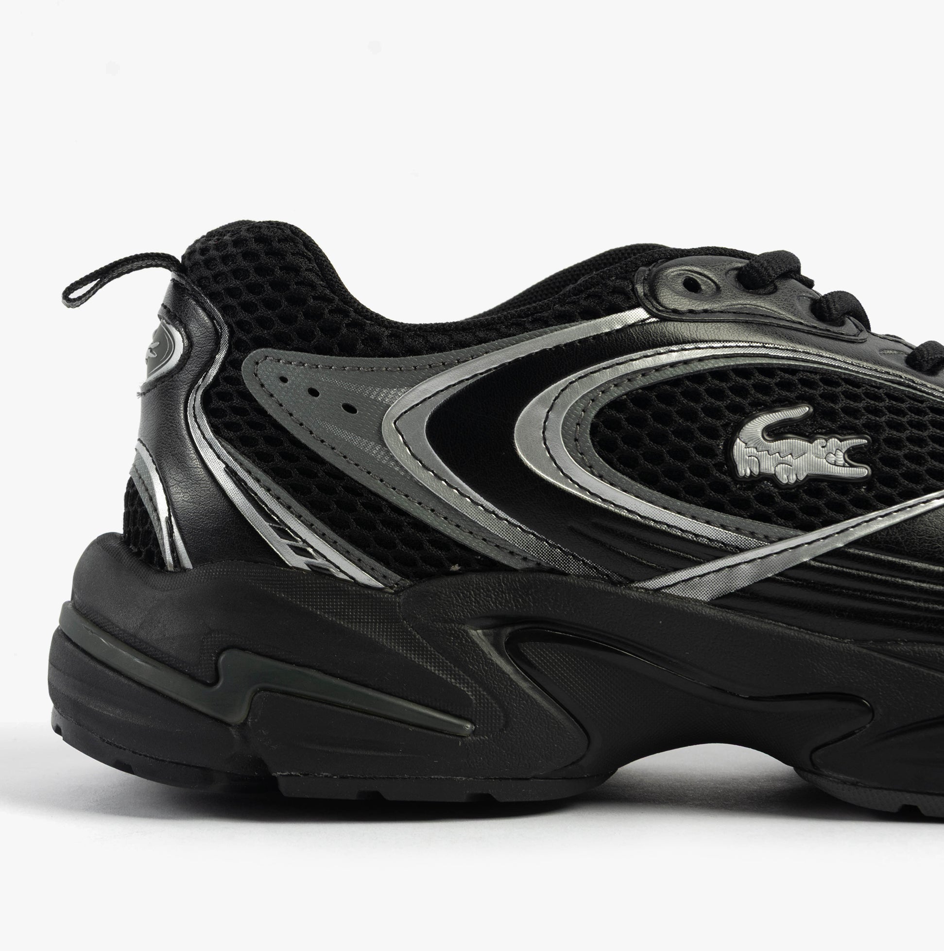 Lacoste STORM 96 2K Mens Trainers Black side view with mesh and leather upper and sleek design.