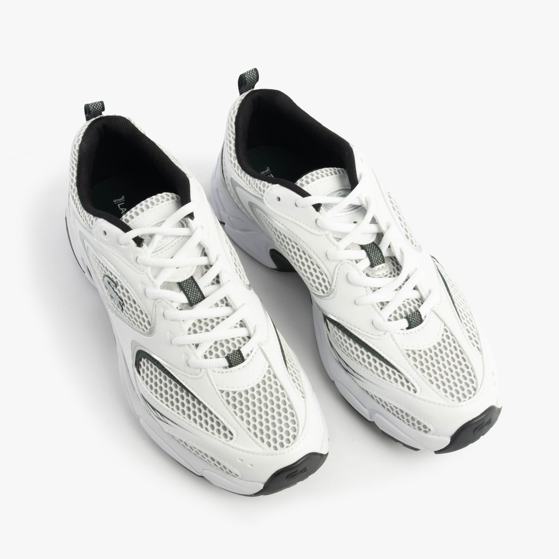 Lacoste STORM 96 2K Mens Trainers White/Dark Green top view, featuring breathable mesh and lace-up closure.