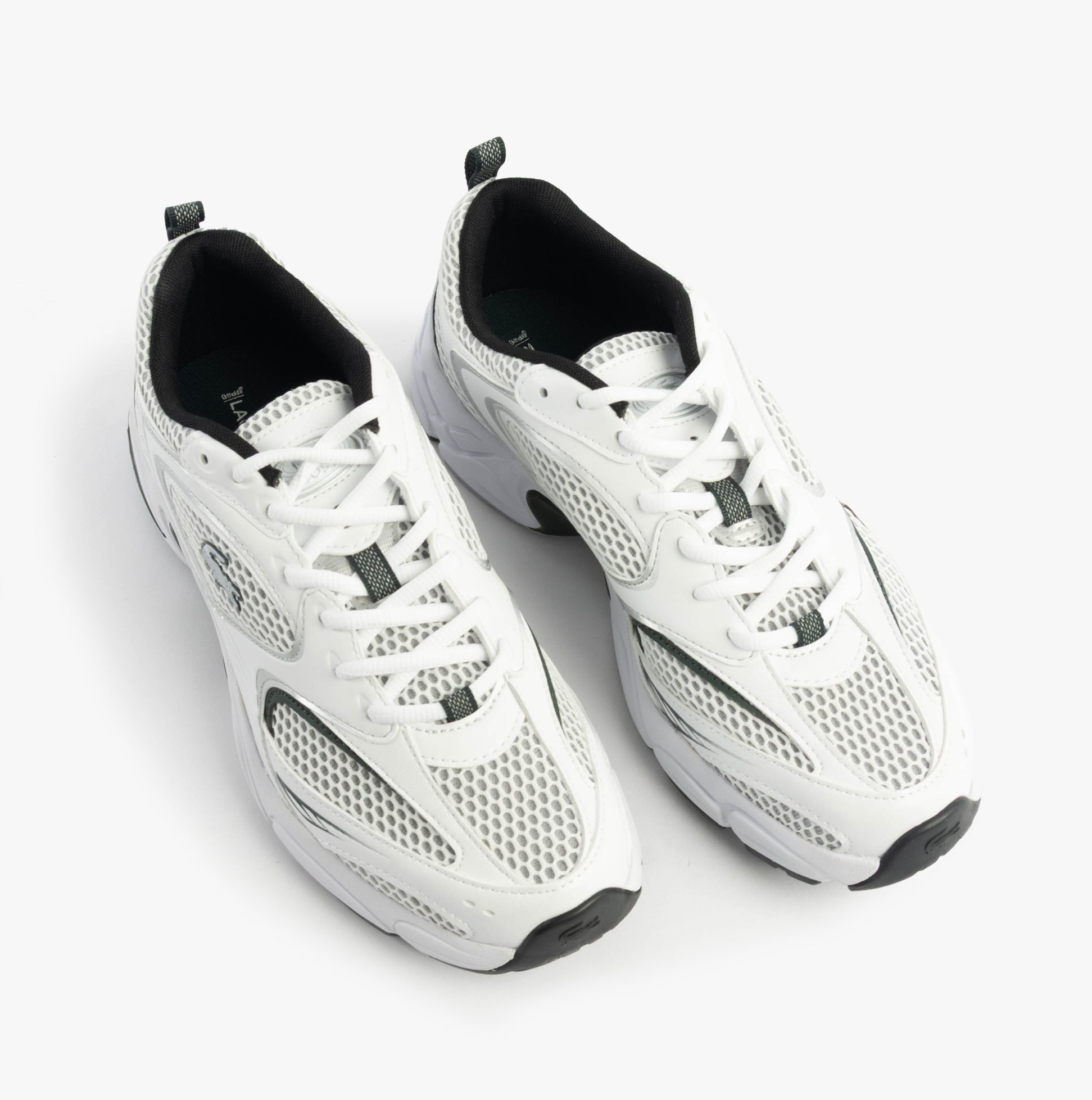 Lacoste STORM 96 2K Mens Trainers White/Dark Green top view, featuring breathable mesh and lace-up closure.