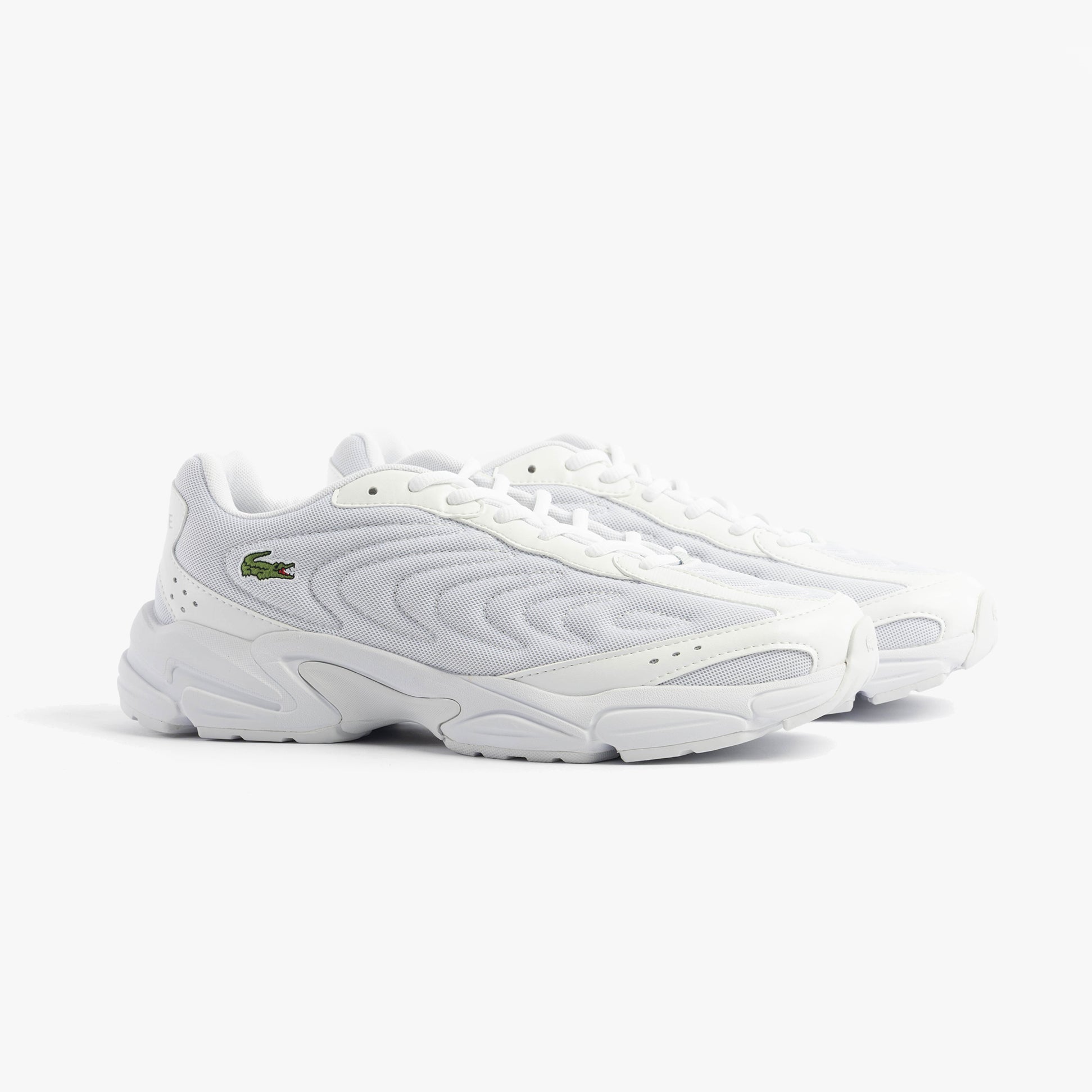 Lacoste STORM 96 2K LITE Mens Trainers White side view showing stylish leather and polyester build.