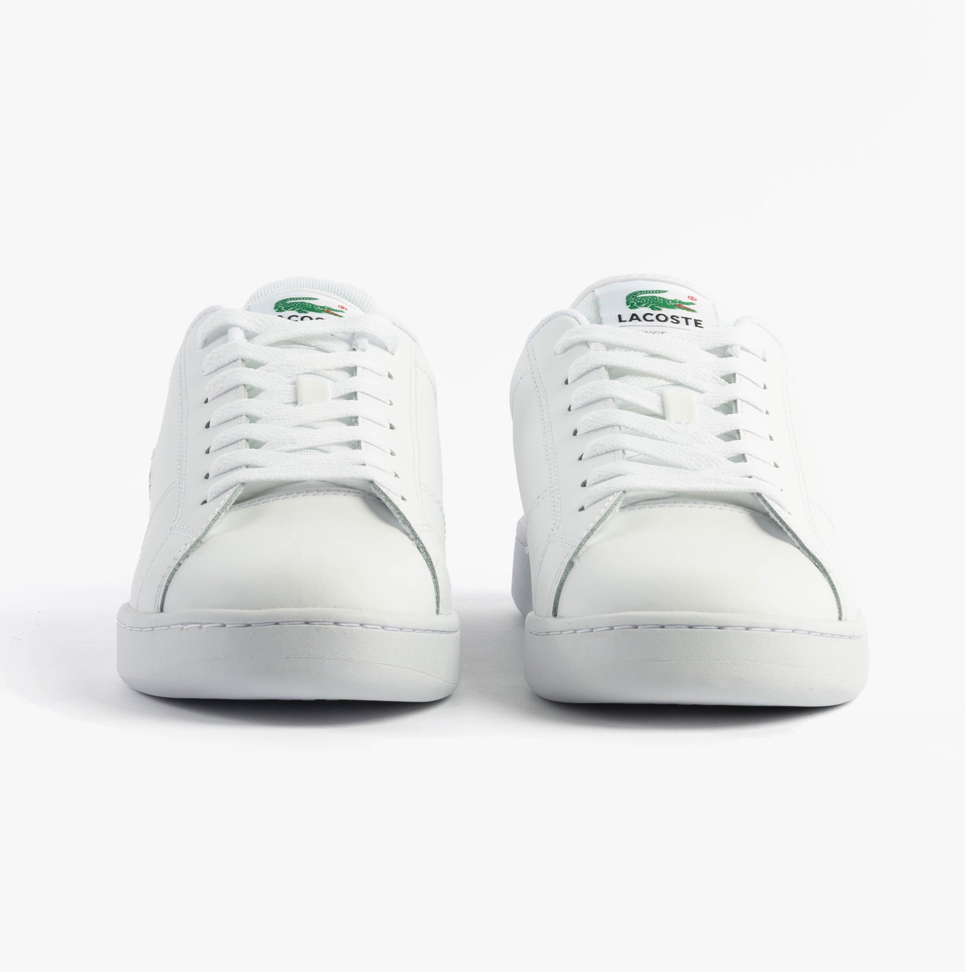 Lacoste CARNABY CUP Mens Trainers White front view showcasing lace-up design and leather upper.