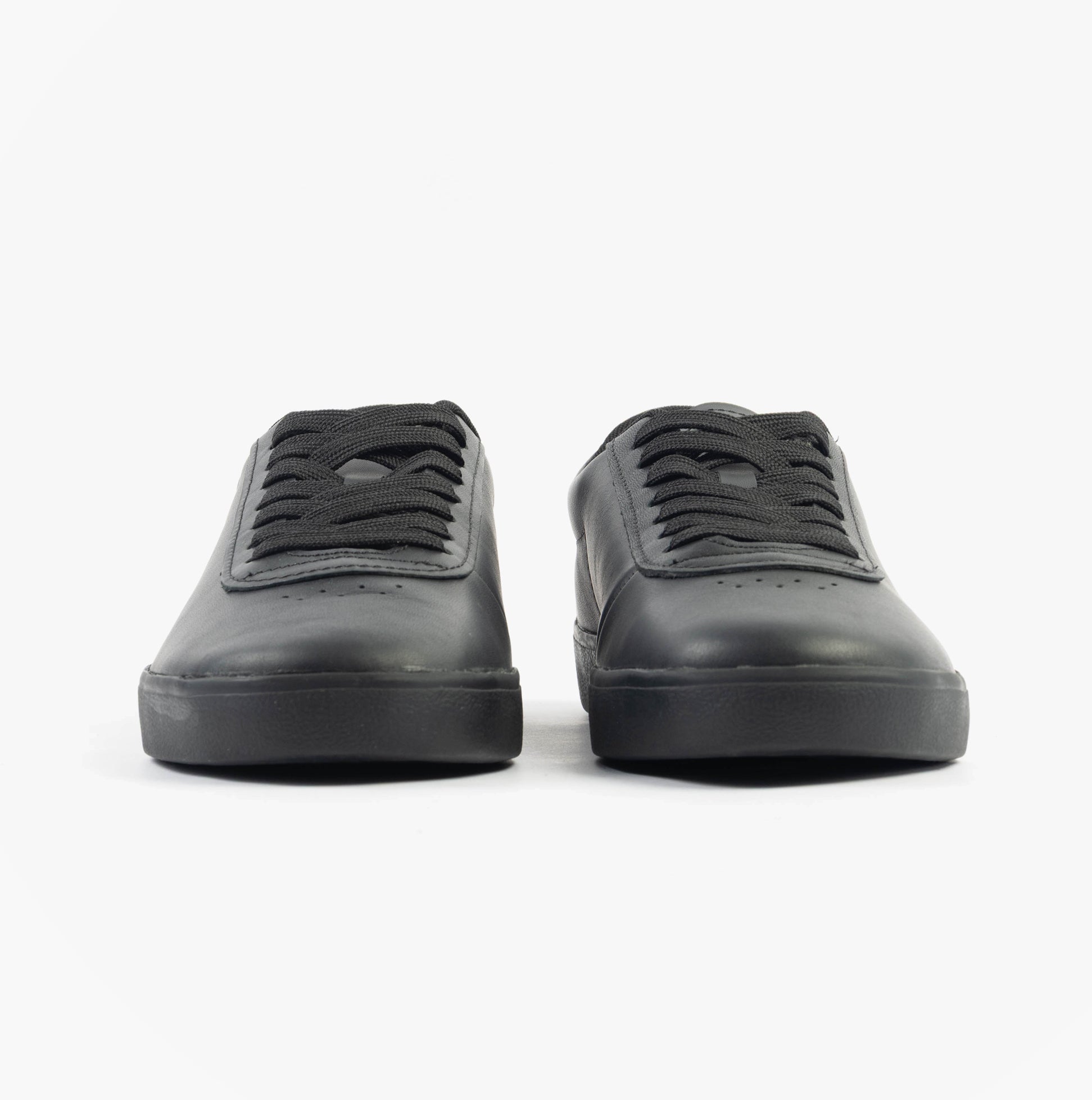 Lacoste BASESHOT EVO Mens Trainers Black front view showing lace-up design and suede/leather upper.