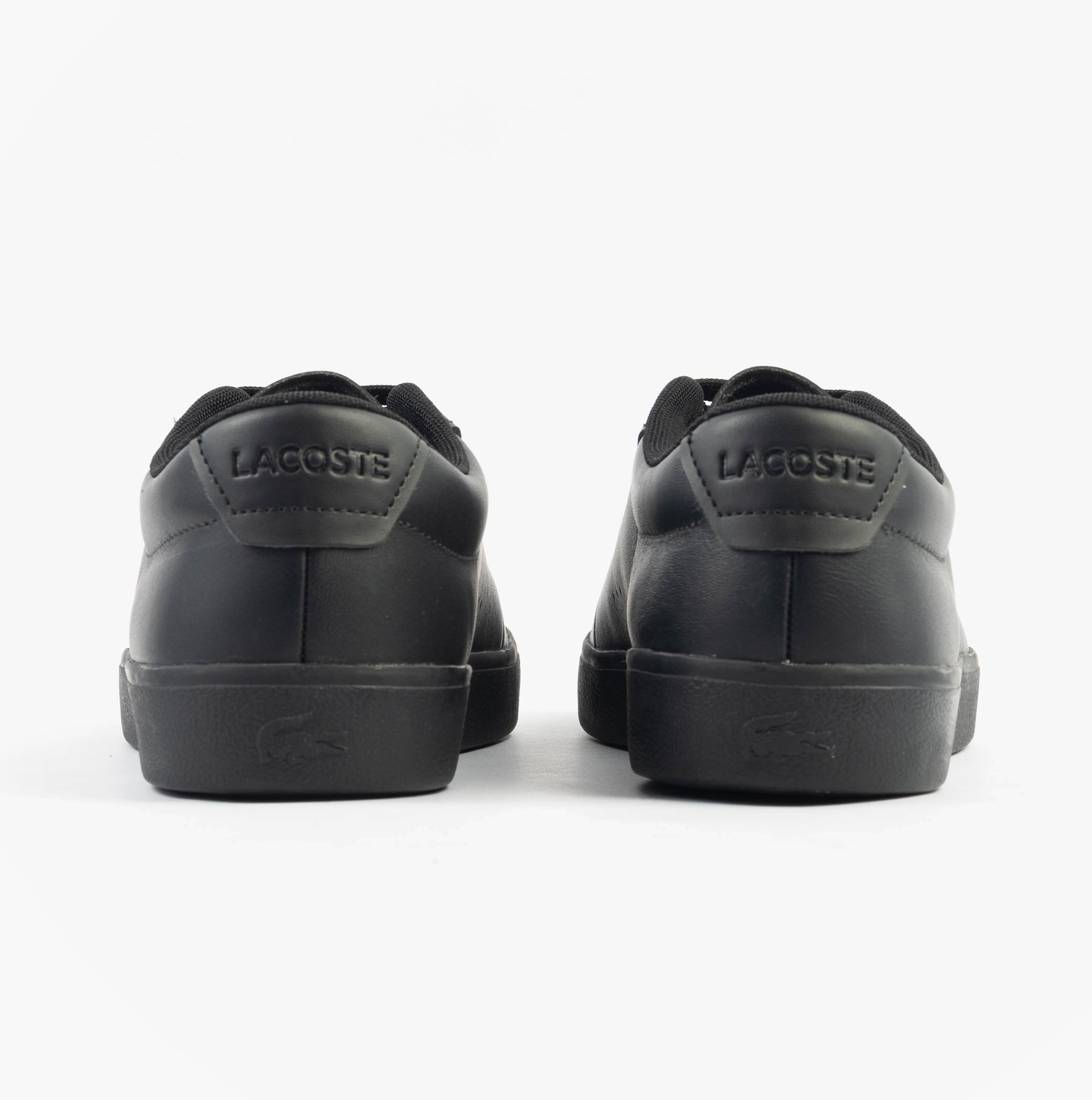Lacoste BASESHOT EVO Mens Trainers Black rear view featuring suede and leather upper, low-top design, and lace-up closure.