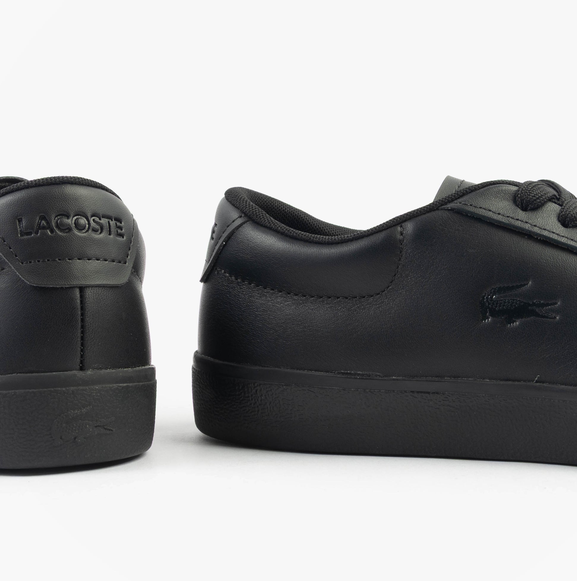 Lacoste BASESHOT EVO Mens Trainers Black rear side view showcasing black suede/leather with lace-up closure.