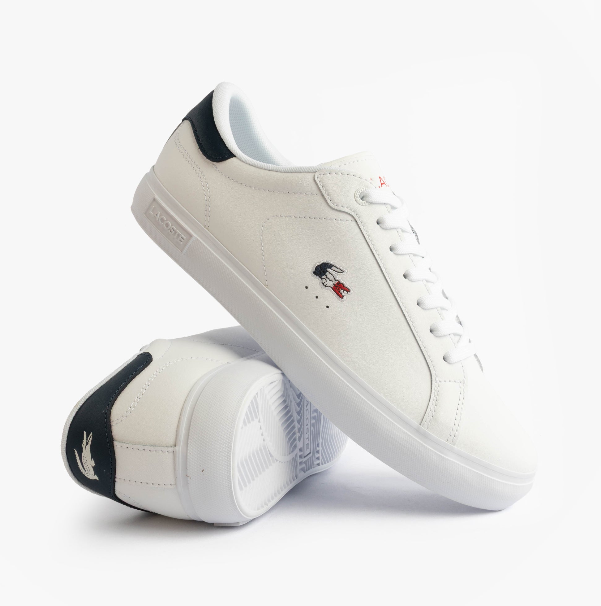 Lacoste POWERCOURT Mens Court Trainers Trainers White/Navy/Red side view showcasing leather upper and rubber sole.