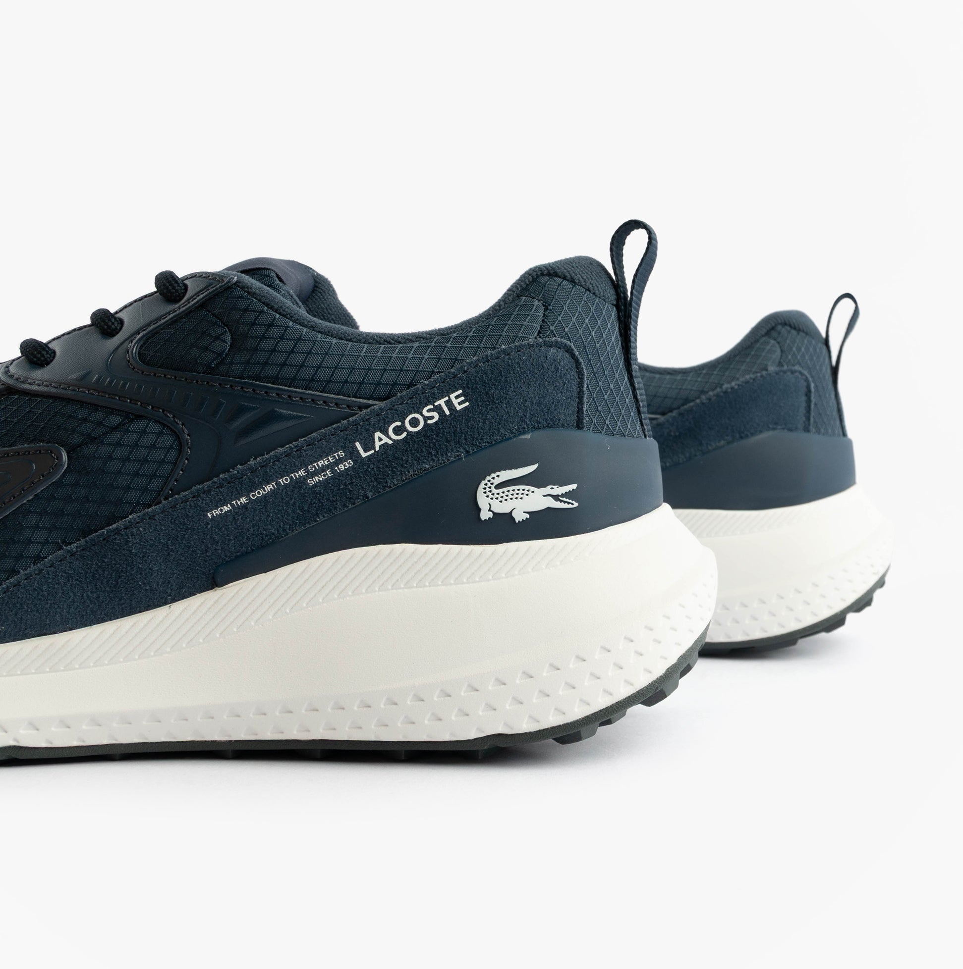 Lacoste L003 EVO Mens Performance Trainers Trainers Navy/White back view, featuring rubber/EVA sole and breathable design.