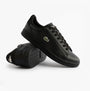 Lacoste CARNABY SET Mens Court Trainers Trainers Black side view showcasing leather upper and rubber sole.