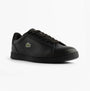 Lacoste CARNABY SET Mens Court Trainers Trainers Black side view showcasing leather upper and lace-up closure.