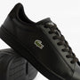 Lacoste CARNABY SET Mens Court Trainers Trainers Black side view showcasing leather upper and iconic logo.