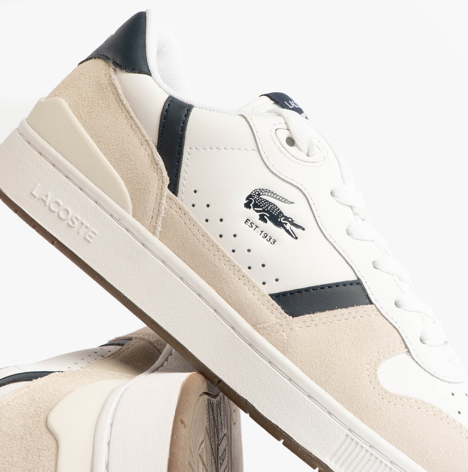 Lacoste T-CLIP SET Mens Court Trainers Trainers White/Navy side view with leather and suede details.