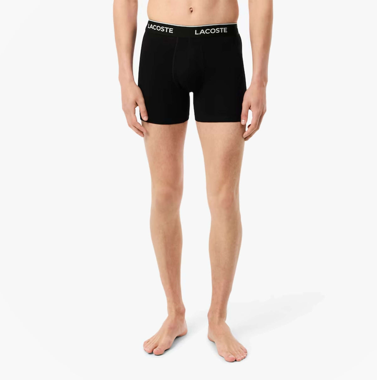 Lacoste 3 Pack Boxer Briefs Mens Boxer Briefs Black/White/Silver Chine front view on model displaying black briefs with logo.