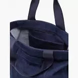 Levi's ICON TOTE Womens Bag Dark Blue interior view showcasing spacious compartments and comfortable handle.