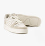 Levi's GLIDE L Womens Trainers Ecru side view showing casual leather and suede design with lace-up closure and low top profile.
