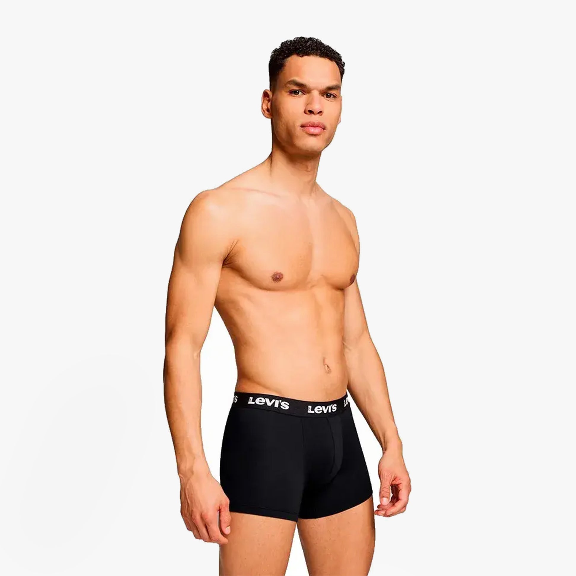 Levi's REPEAT LOGO Mens 2 Pack Trunks Black side view on a model showcasing the elastic waistband and fit.