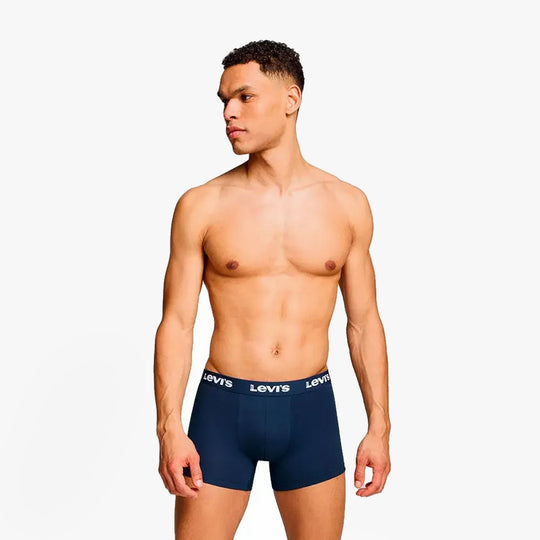 Levi's REPEAT LOGO Mens 2 Pack Trunks Navy front view on model, showcasing elastic waistband and fitted design.