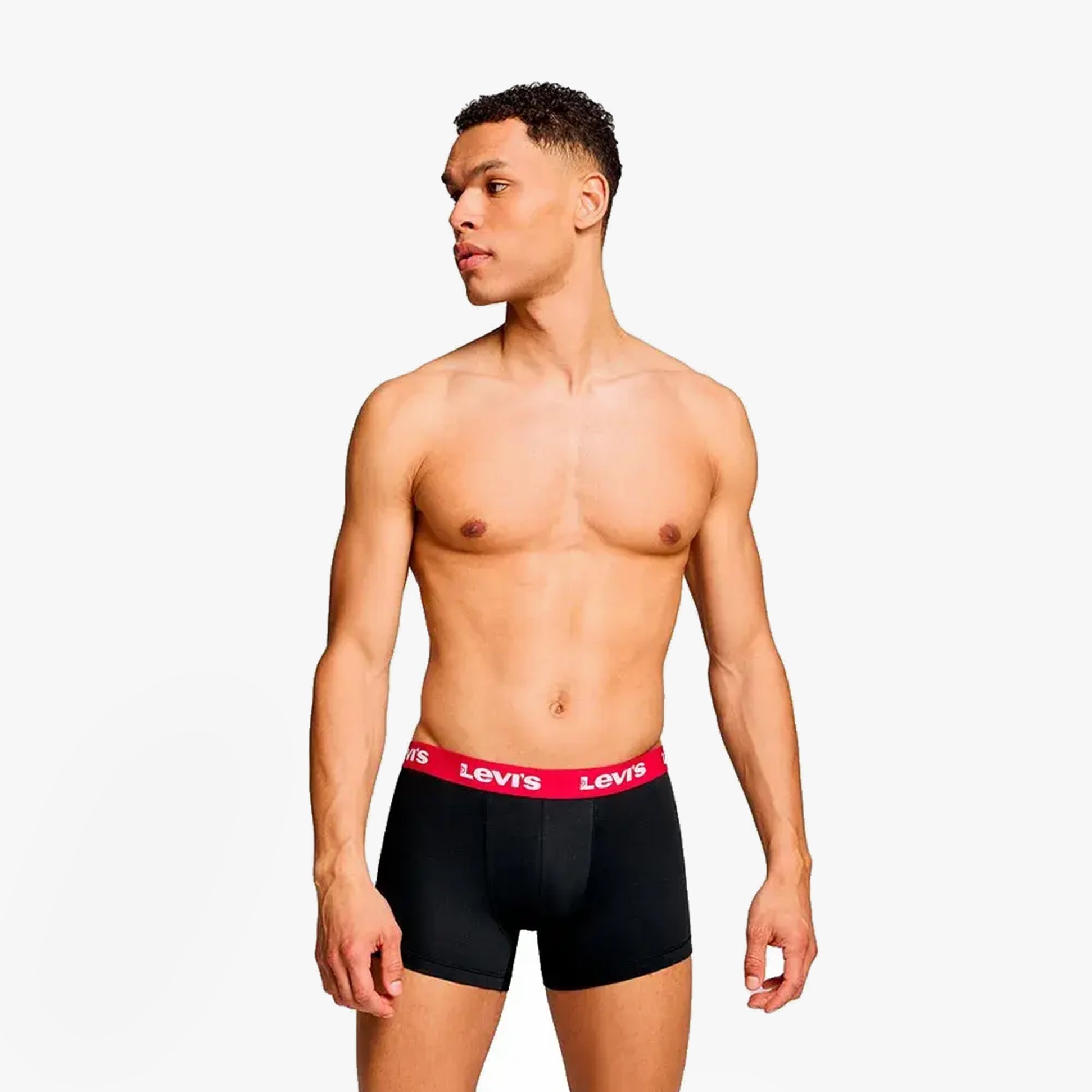 Levi's REPEAT LOGO Mens 2 Pack Trunks Black/Red side view model wearing trunks with red waistband