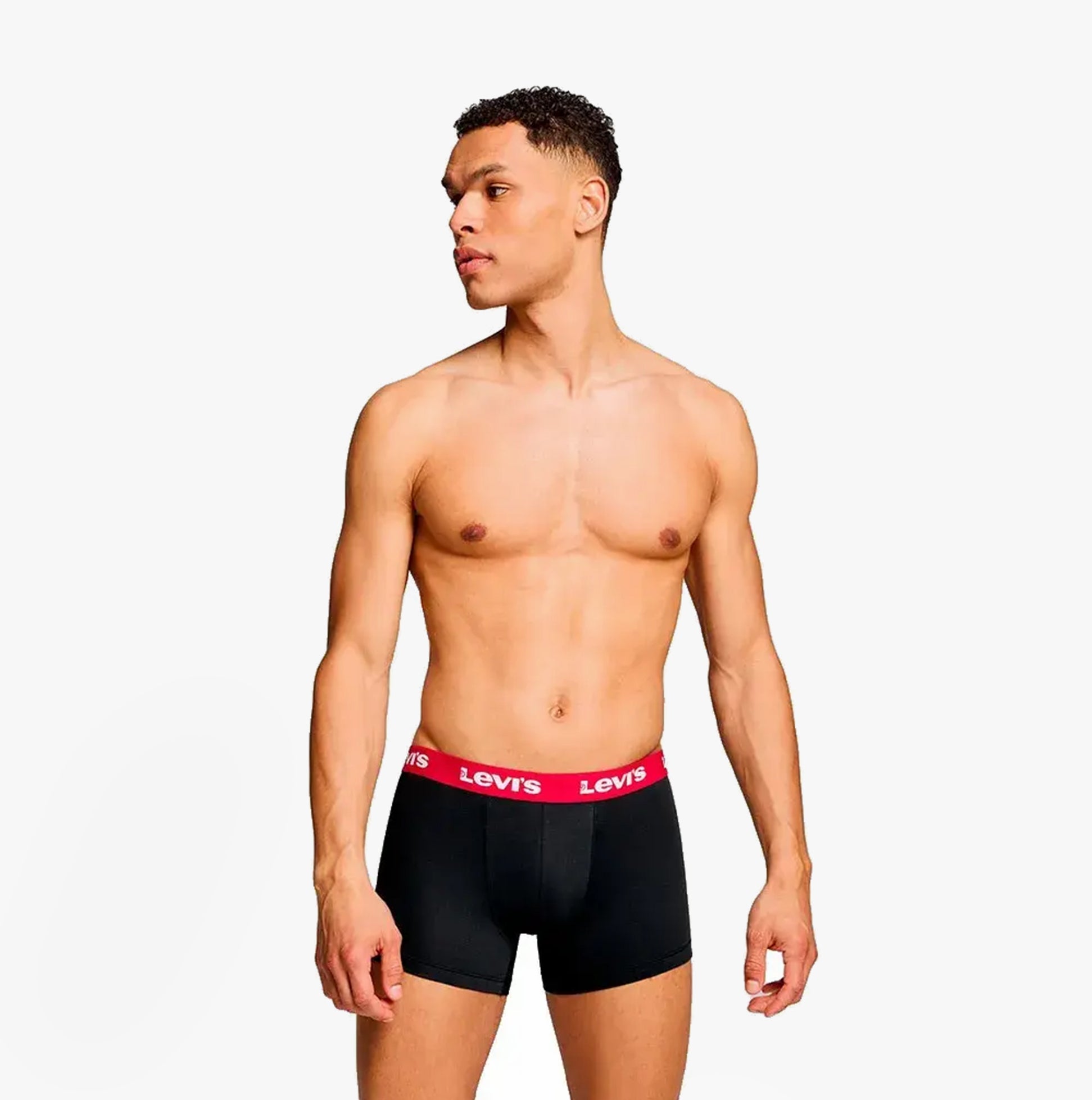 Levi's REPEAT LOGO Mens 2 Pack Trunks Black/Red side view model wearing trunks with red waistband