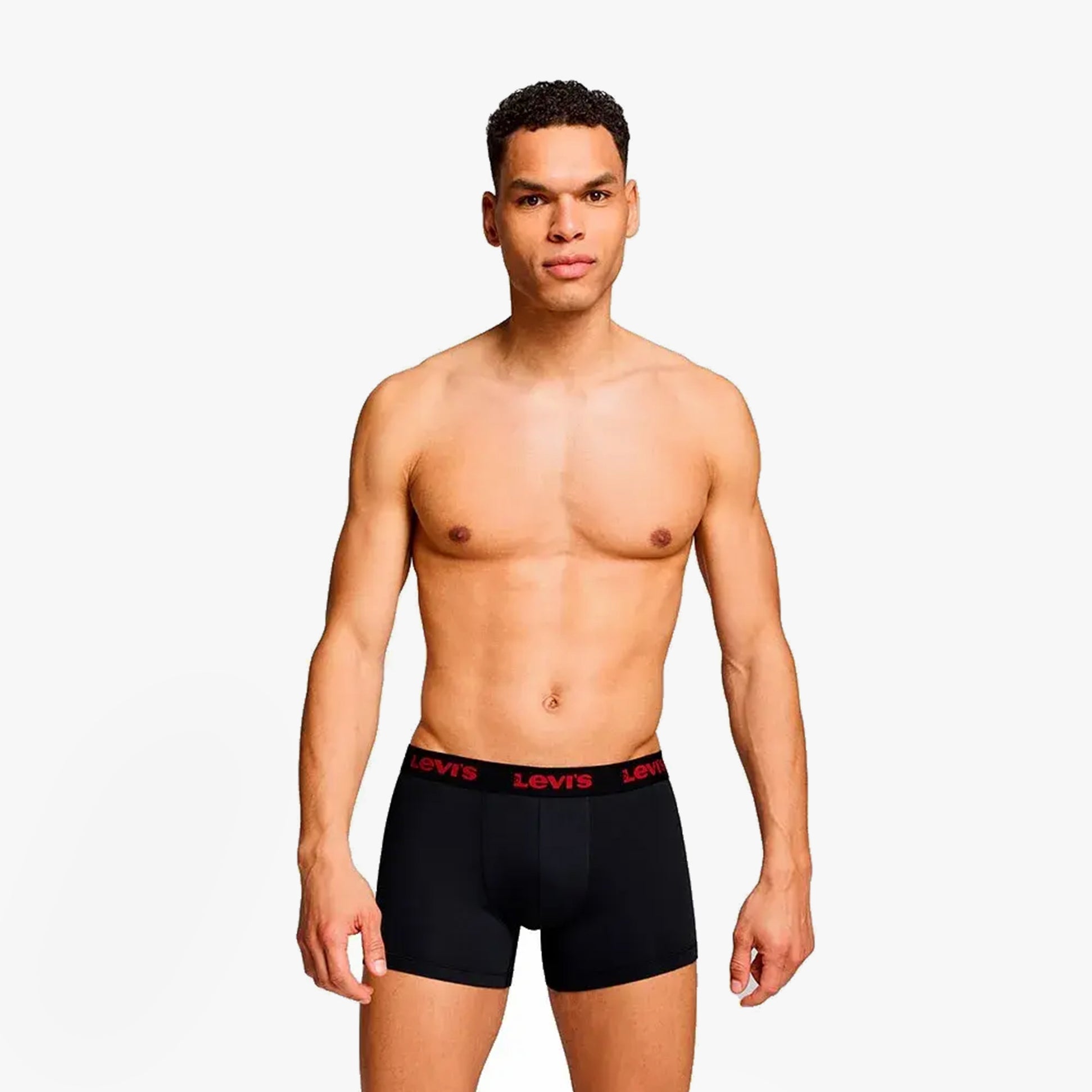 Levi's REPEAT LOGO Mens 2 Pack Trunks Red Combo front view on model, showing elastic waistband and fitted design.