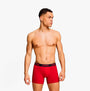 Levi's REPEAT LOGO Mens 2 Pack Trunks Red Combo side view on model showcasing elastic waistband with logo.