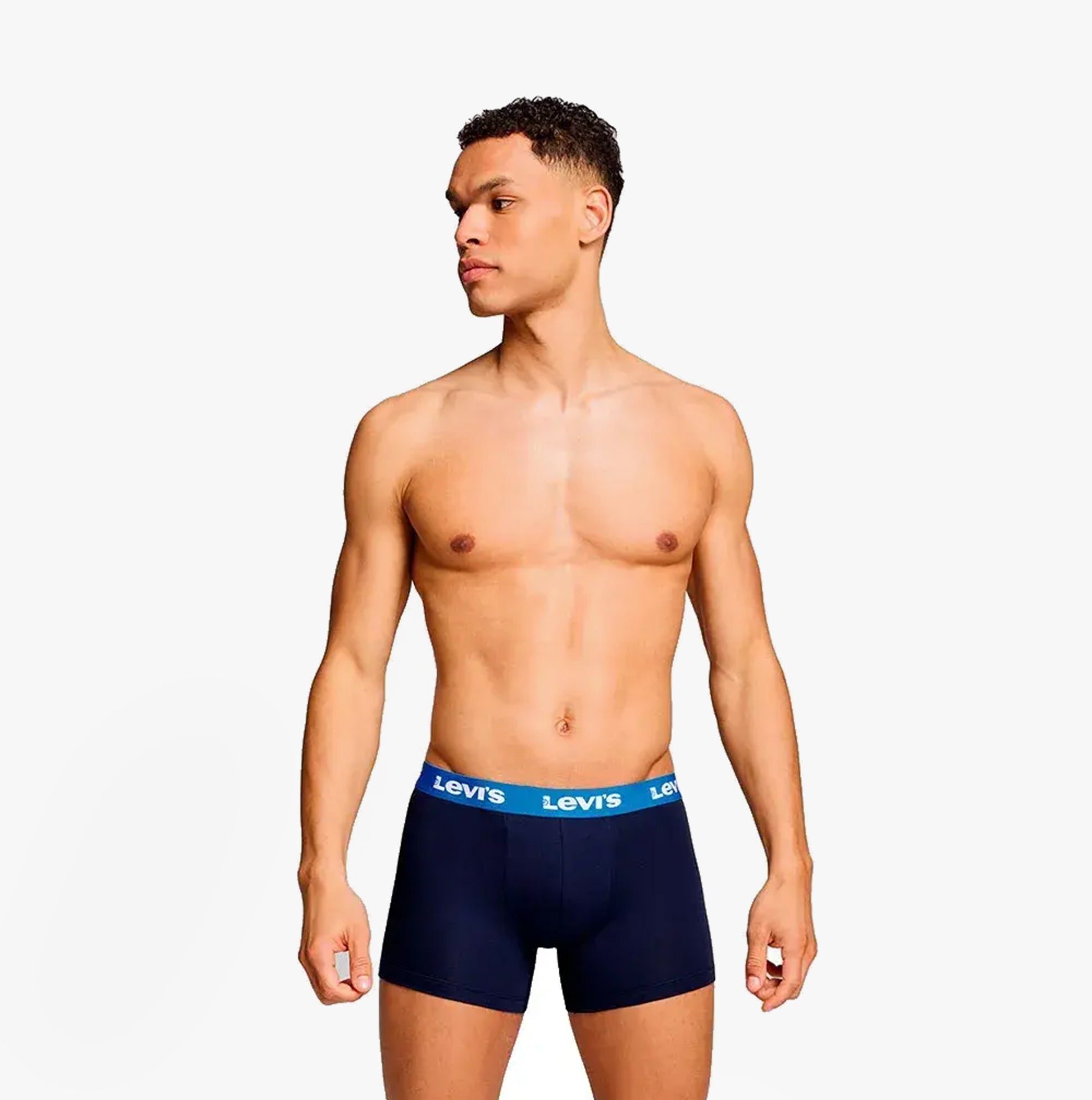 Levi's REPEAT LOGO Mens 2 Pack Trunks Blue Combo front view showing model wearing trunks with elastic waistband.