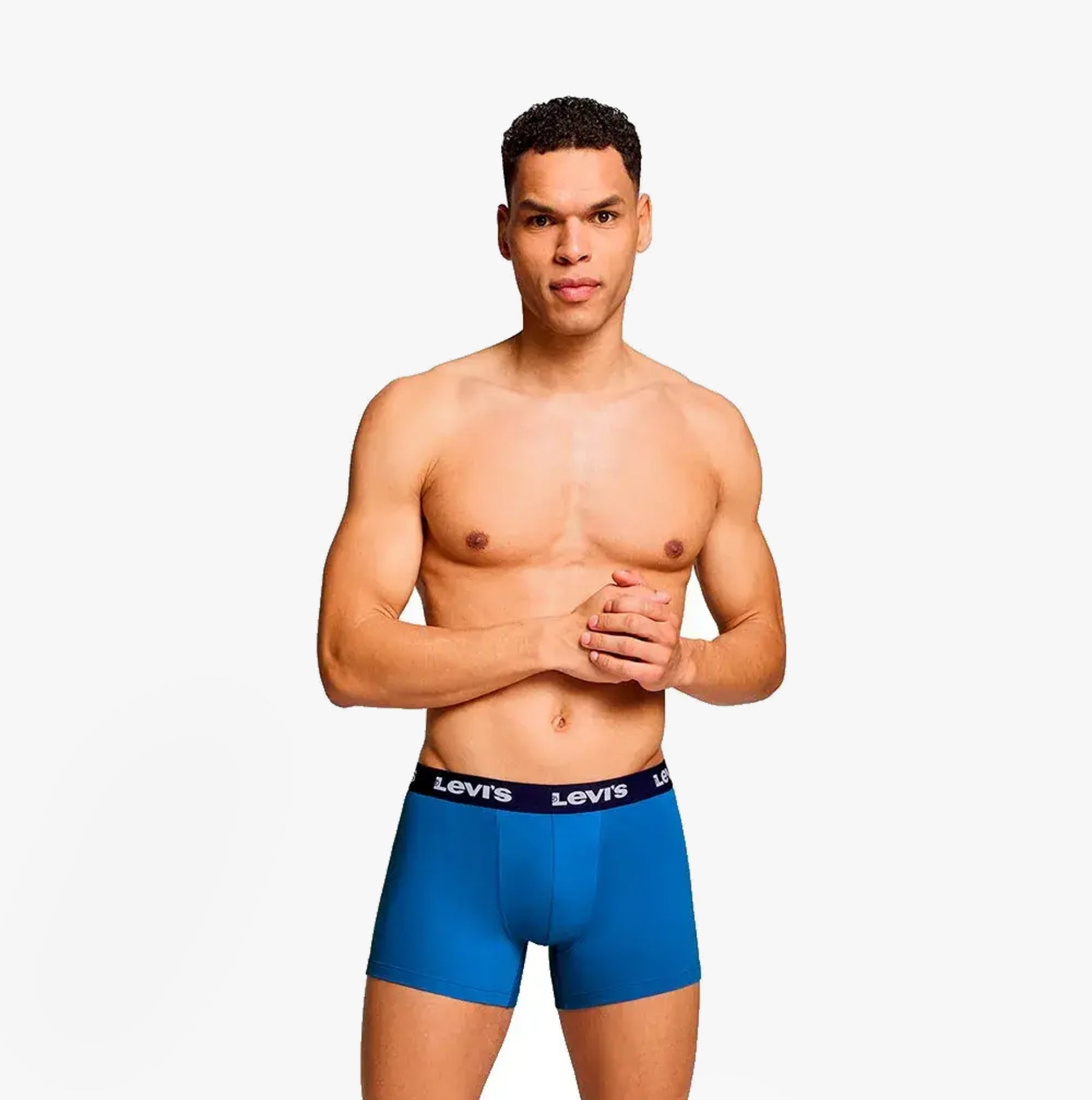Levi's REPEAT LOGO Mens 2 Pack Trunks Blue Combo front view on model showing elastic waistband and ergonomic pouch.