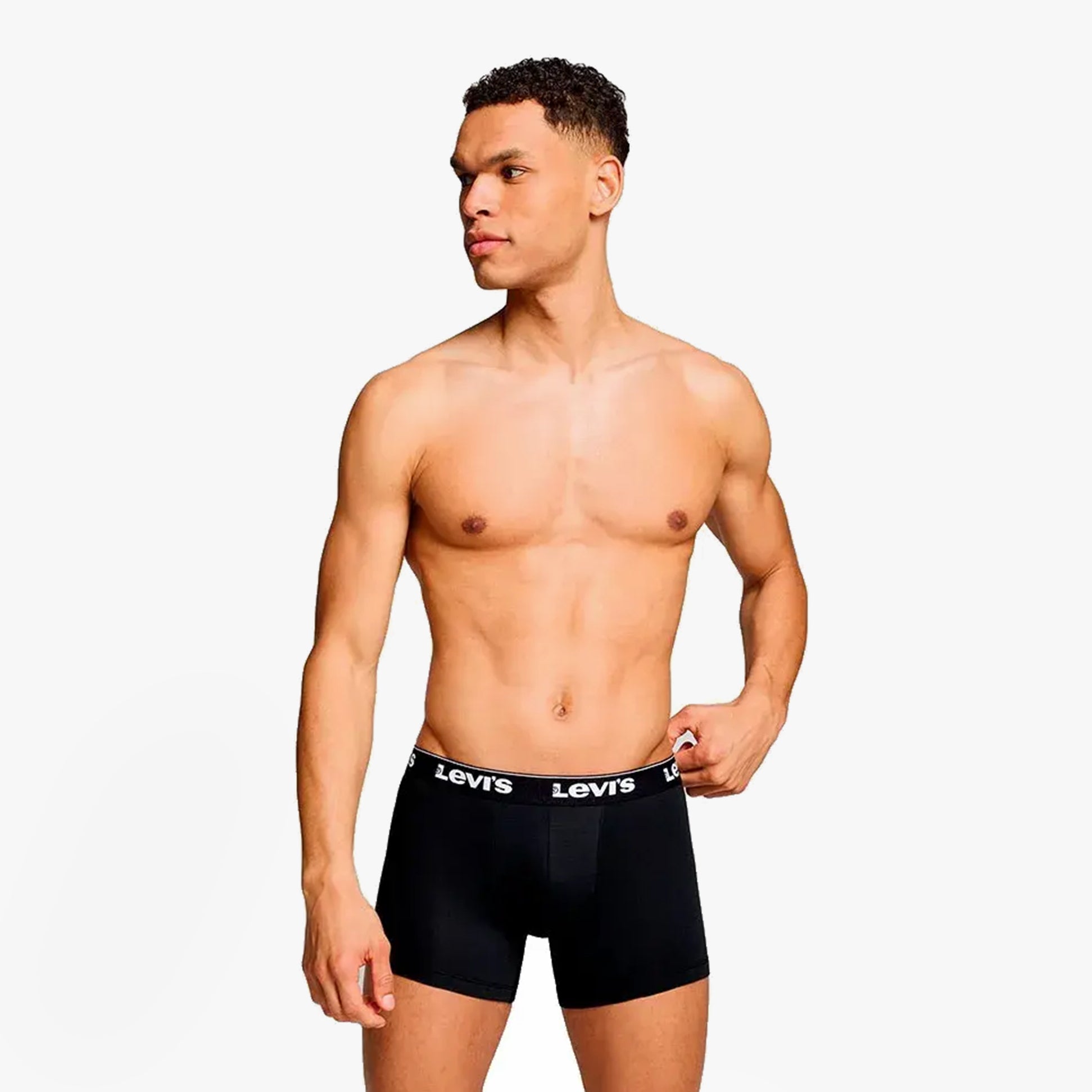 Levi's REPEAT LOGO Mens 3 Pack Trunks Black side view on model showing elastic waistband and supportive pouch.