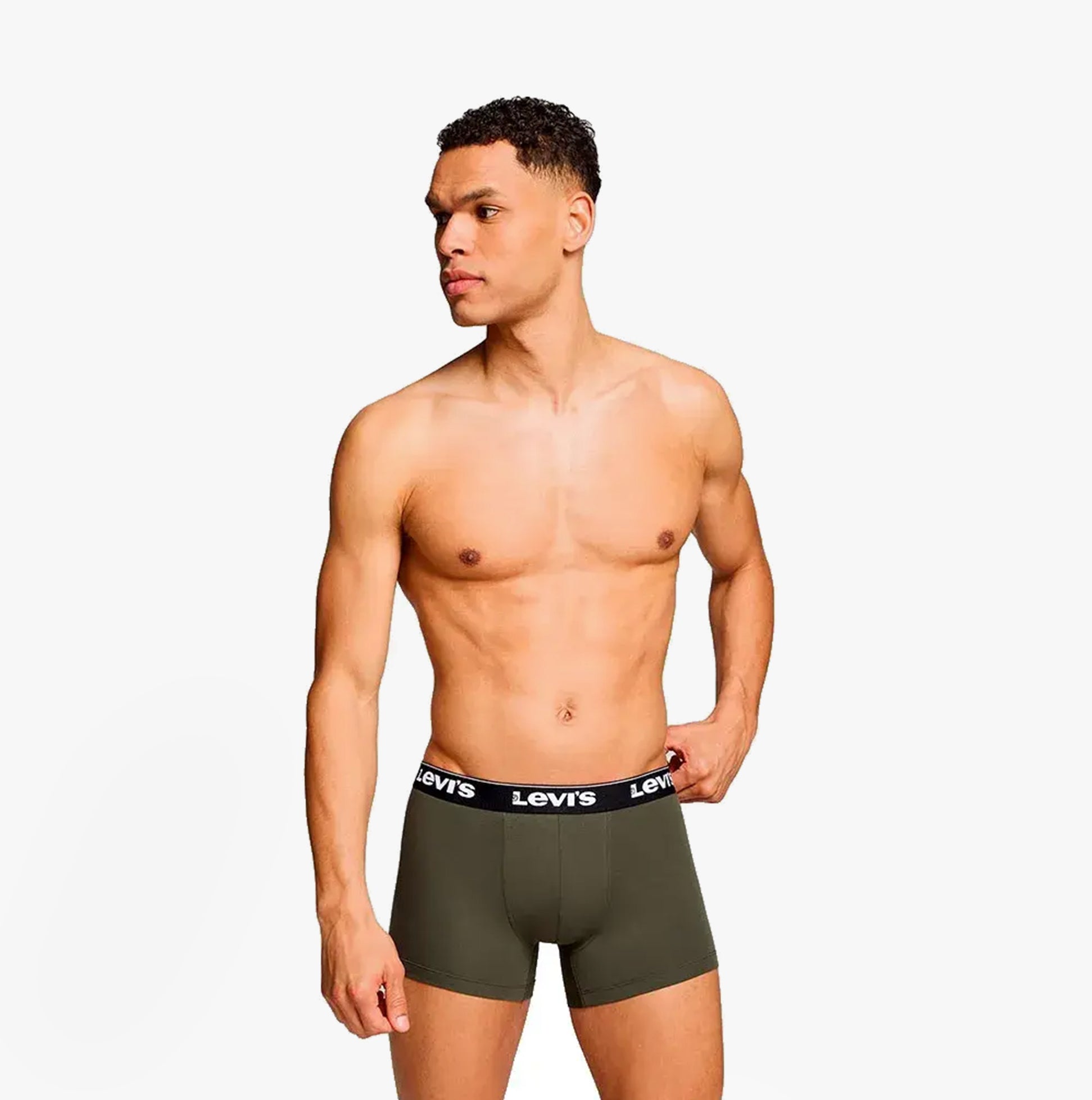 Levi's REPEAT LOGO Mens 3 Pack Trunks Khaki Combo side view model wearing boxer trunks with elastic waistband
