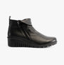 Lotus CORDELIA Womens Boots Black side view showcasing leather ankle boots with wedge heel and zip closure.
