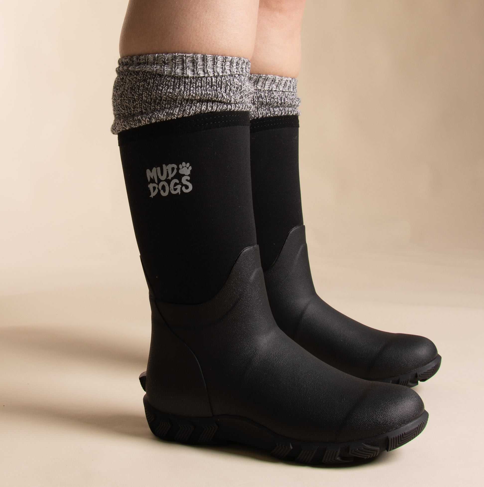 Mud Dogs Womens Welly Boot Socks Grey worn with black boots side view, showcasing the stylish wool blend design.